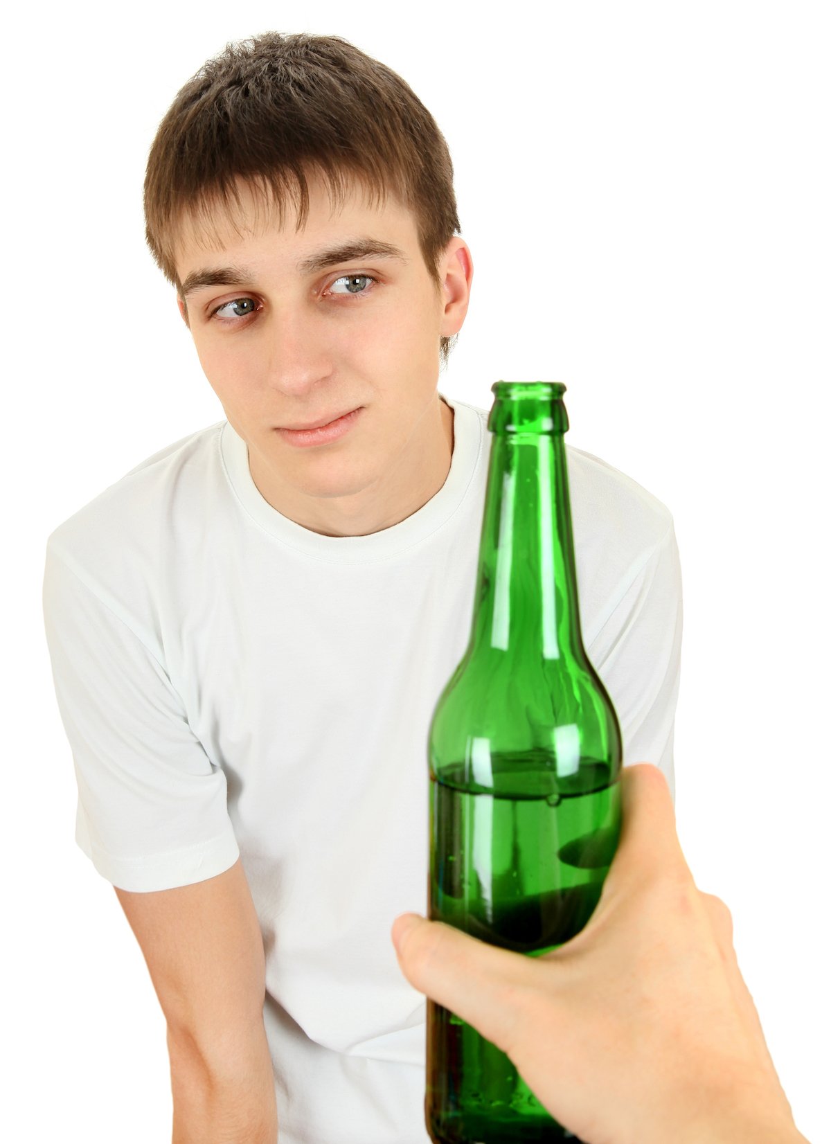 Young man being offered a beer against a white background
