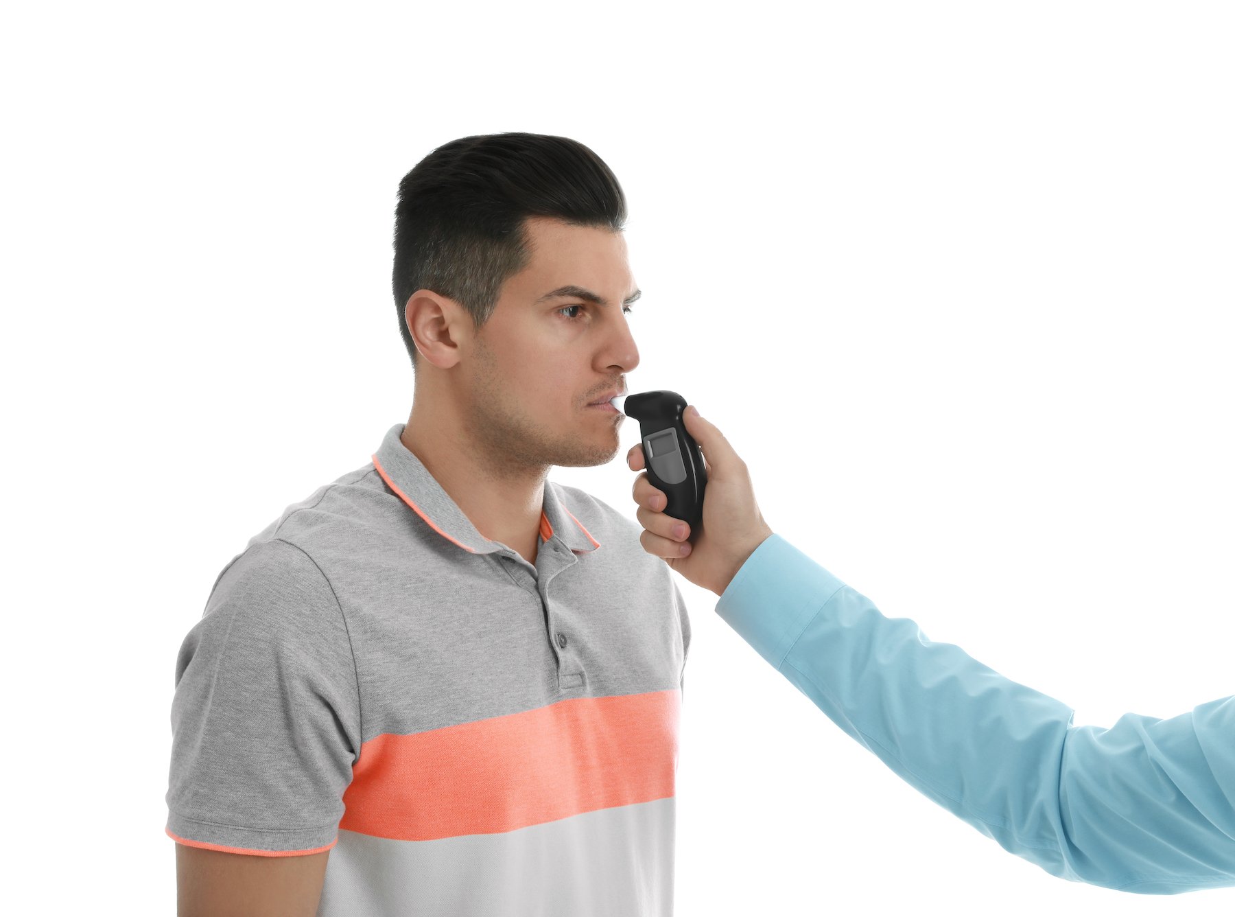 DUI suspect submitting to a breath test following a DUI traffic stop