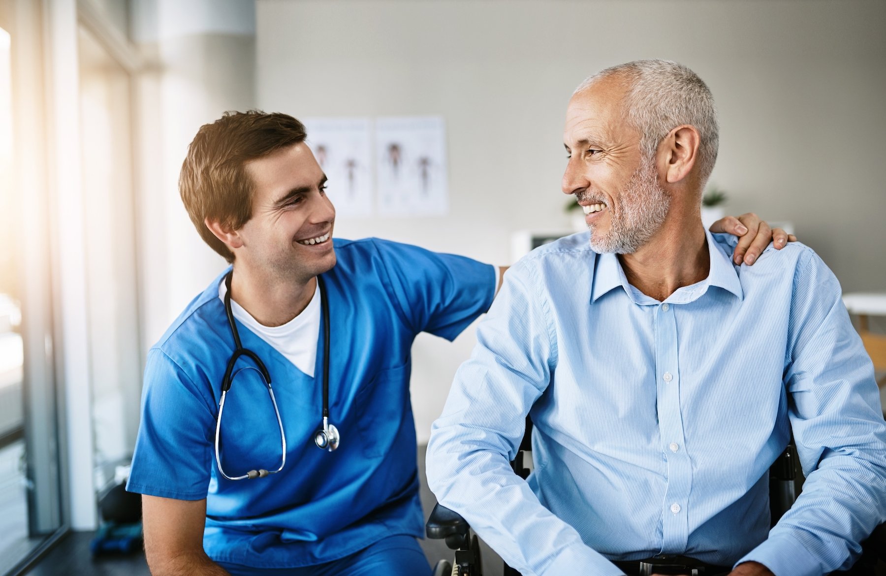 Nurse encouraging a patient following a check-up
